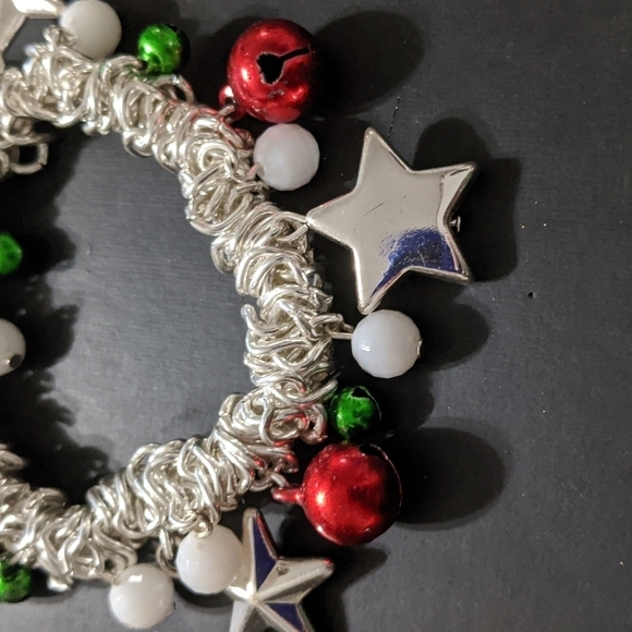 Silver Tone Stars Red and Green Bells White Beads Stretchy Statement Bracelet - Picture 2 of 3